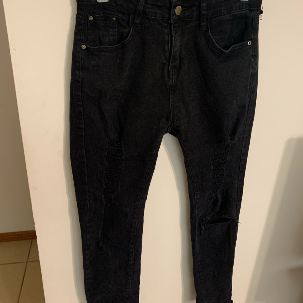 Black jeans with rips